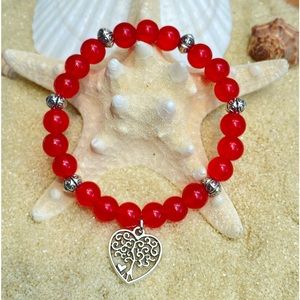 Beaded bracelet- red and silver tone with heart shaped tree of life charm
